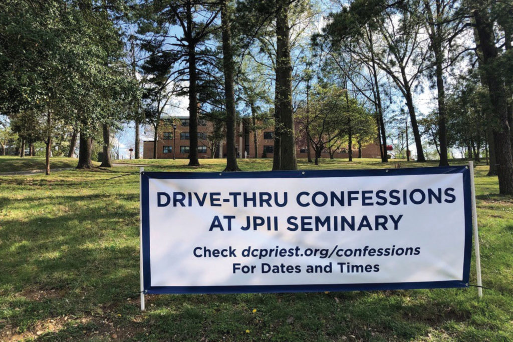 Drive through confessions sign