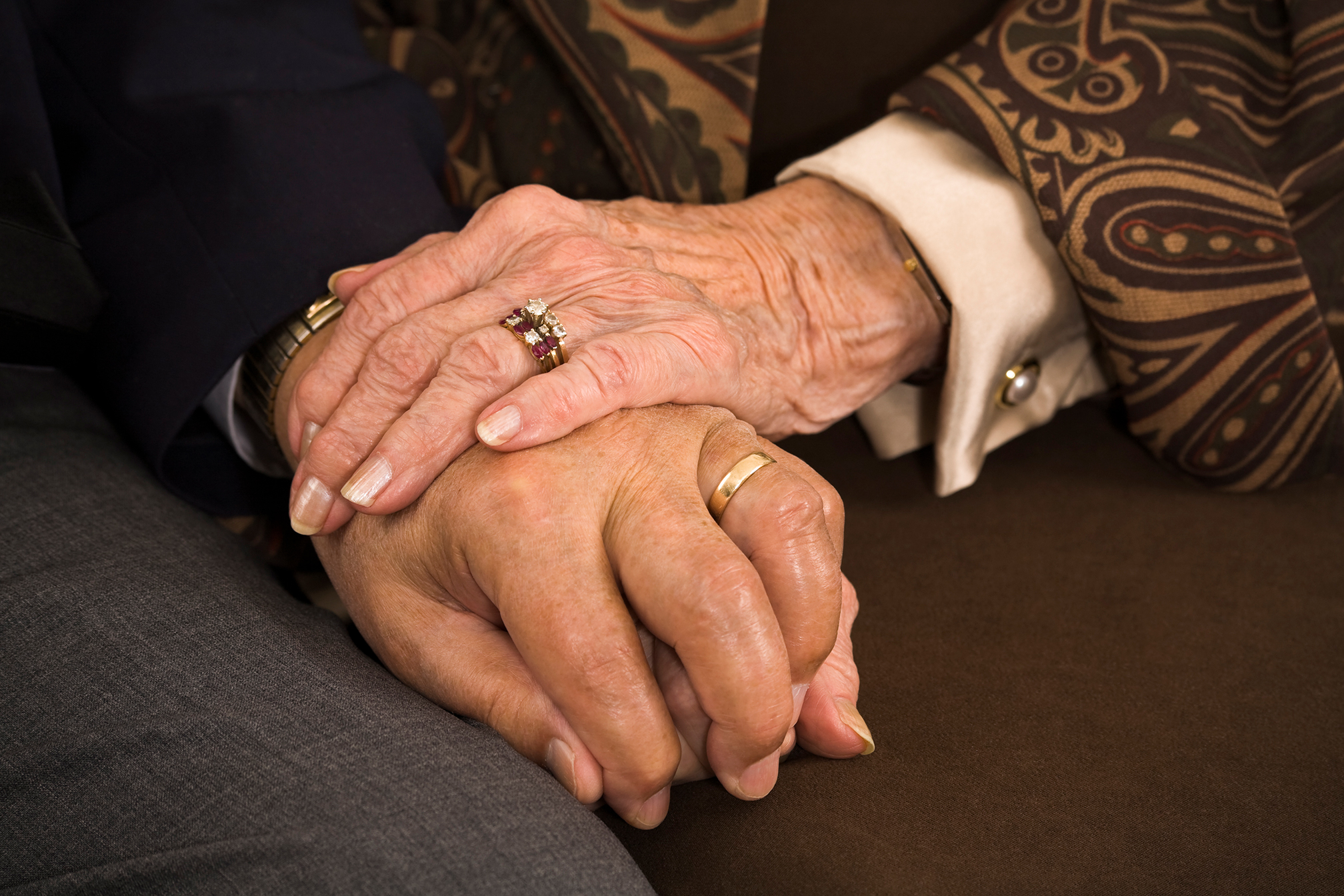 Elderly Married. Couple Holding Hands