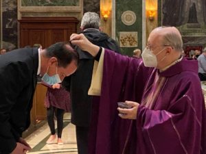 Msgr. Jameson sprinkles ashes on Ash Wednesday