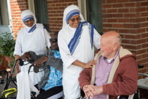 Religious sisters care for the elderly.