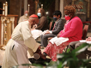 Cardinal Gregory washes feet on Holy Thursday at the Cathedral of St. Matthew the Apostle.