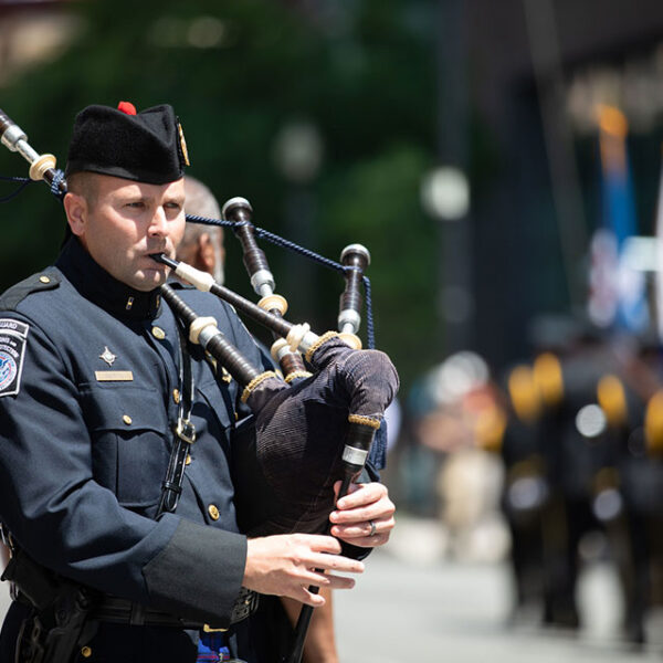 Officers Playing Bagpipes at Blue Mass