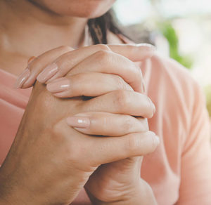 Woman Praying Focus on Hands
