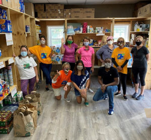 deliver bags of food to needy families