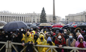 Parishioners attend the "urbi et orbi" blessing