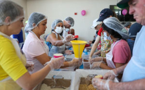 St. Mary’s Parish volunteers pack meals for Ukrainian refugees.