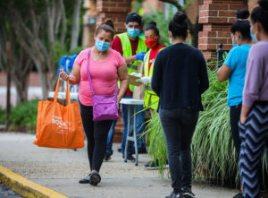 people receive help at a food pantry