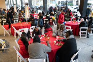 Guests receive a Christmas dinner