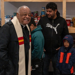 blessing the new food pantry