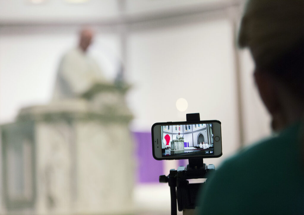 Live streaming a Mass on an iPhone.