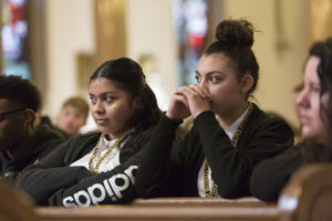 Students pray.