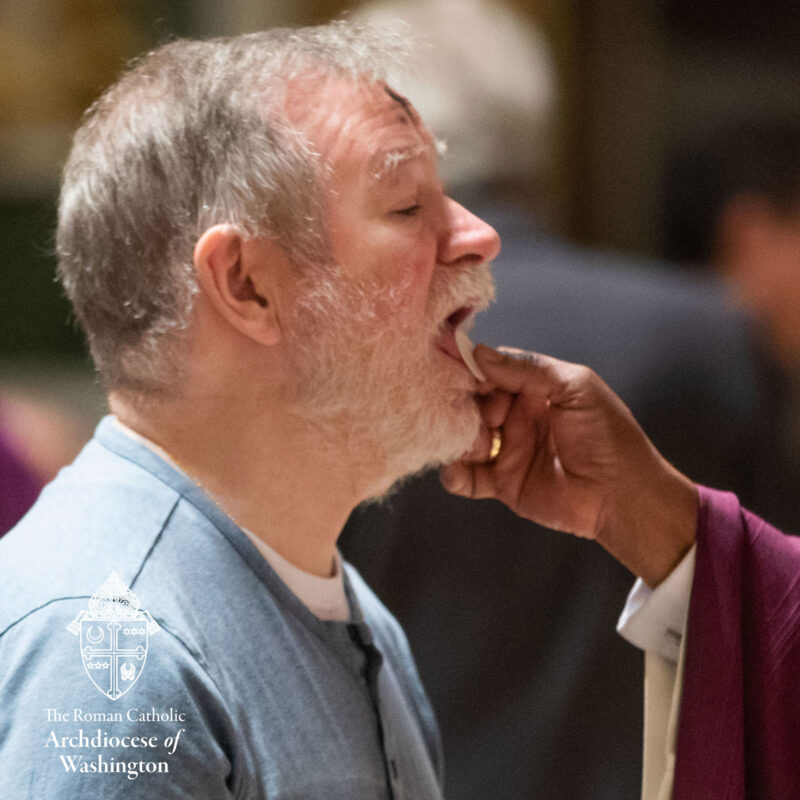 Ash Wednesday Man being delivered Eucharist.