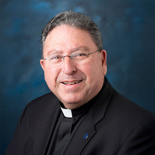 Rev. Allan Figueroa Deck, S.J.